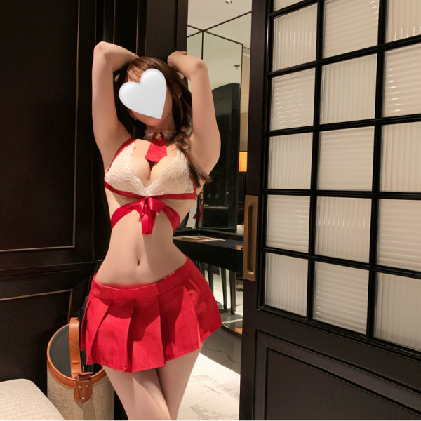 Woman wearing red and white pure & playful lingerie set, a sexy jk-inspired sleepwear with cute student-style design.