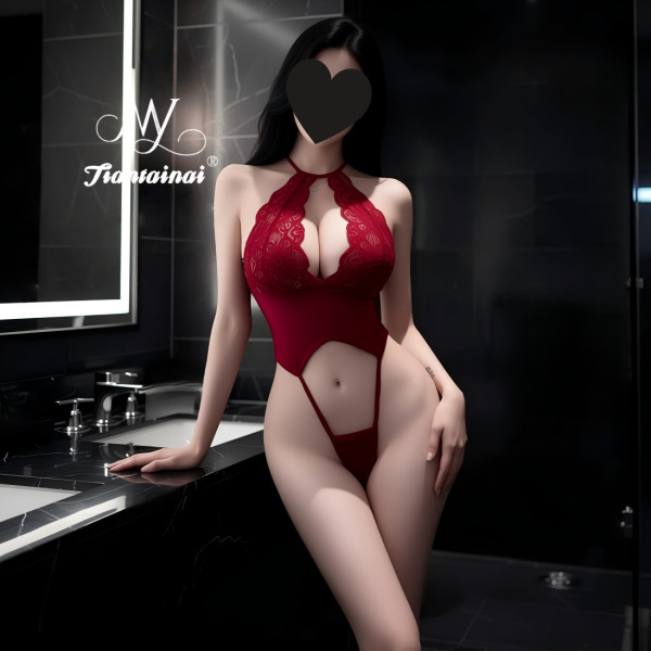 Woman in red lace bodysuit with cutouts, posing in modern bathroom. pure & seductive lace bodysuit set - sexy sleepwear for w...