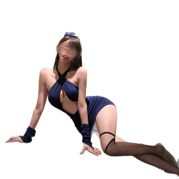 A woman poses in a navy blue lace halter airline uniform set, featuring a deep cut and thigh-high stockings, exuding allure a...