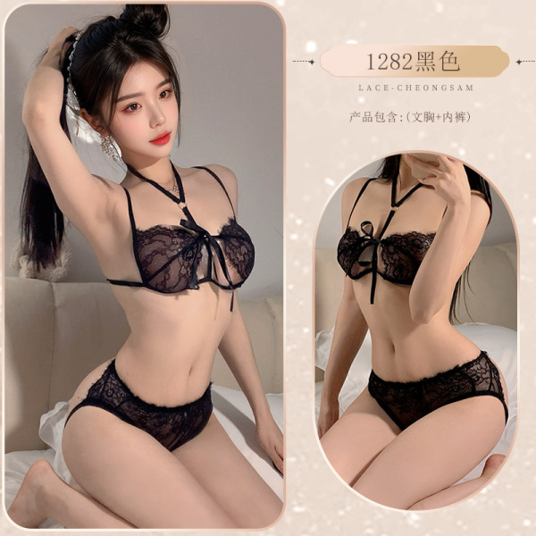 Model wearing black lace push-up bra and matching panty from pure & seductive lingerie set for small busts.