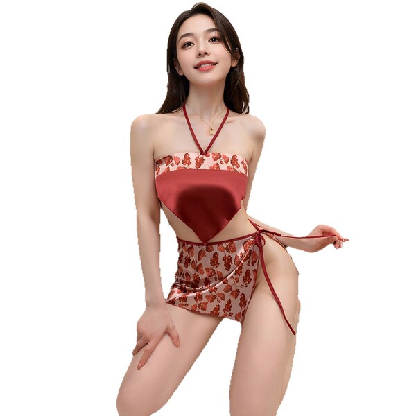 Woman wearing red floral pure & seductive lingerie bodysuit – tempting no-remove bedroom set for her, posing confidently.