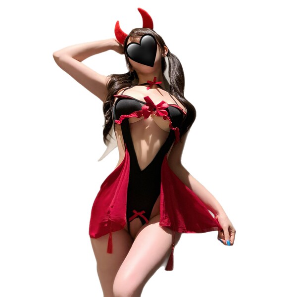 Woman in red and black devil-themed lingerie set with horns, featuring a busty design and playful bow details.