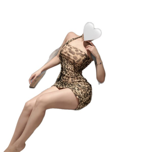 Woman in luxury leopard print lingerie set, posing seductively with heart-shaped face cover. pure & seductive collection.