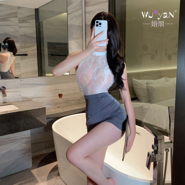 Woman in white lace top and gray mini skirt posing by bathtub in pure & seductive lingerie set - modest yet sexy secretary ou...