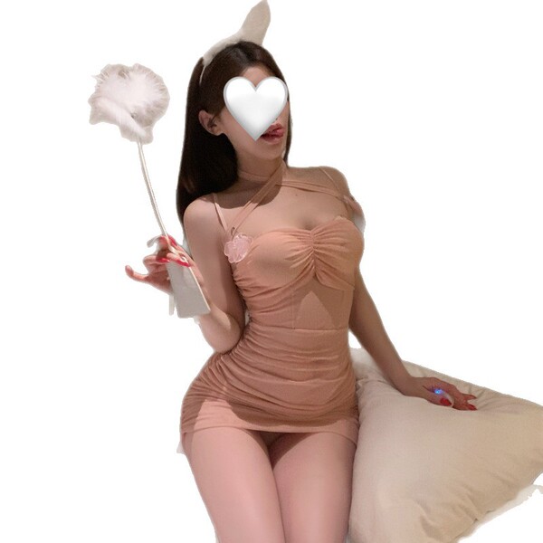 Woman in pure & seductive lingerie set, modest yet sexy bridal sleepwear with bunny ears and feather wand.