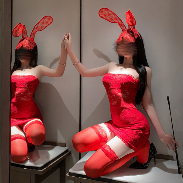 Woman in red lace bodysuit with bunny ears, kneeling pose. pure & seductive lingerie set - sheer lace bodysuit with high-wais...