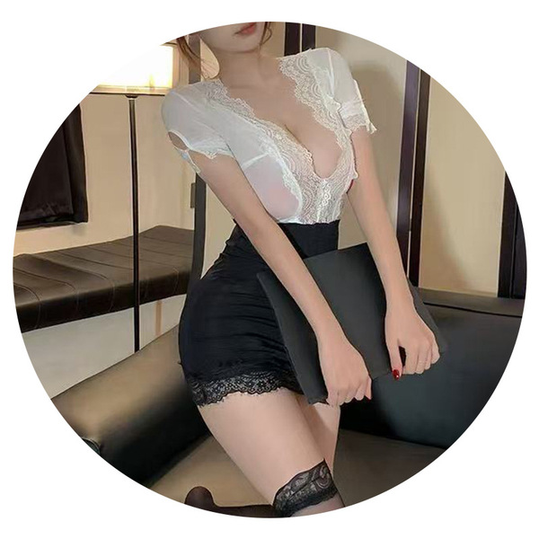 Woman wearing pure & seductive lingerie set – white lace top with black pencil skirt and matching thigh-highs, seated indoors...
