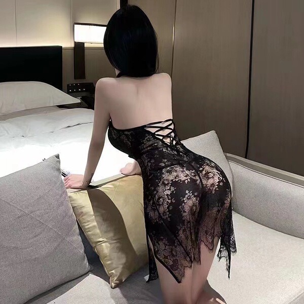 Woman wearing black lace pure & seductive plus size lingerie set, sensual silk qipao-style bedroom outfit with back ties.