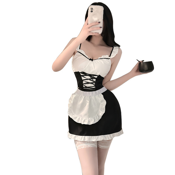 A woman models a black and white maid costume set, featuring a corseted bodice, apron, and lace stockings, perfect for sleepw...