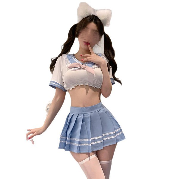 A stylish girl wearing a cute blue and white schoolgirl uniform set, featuring a sailor-style top with ruffles and a pleated ...