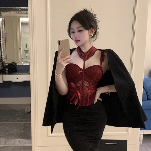 A woman models a luxurious red lace bodysuit with a push-up corset design, perfect for small bust women seeking elegance and ...