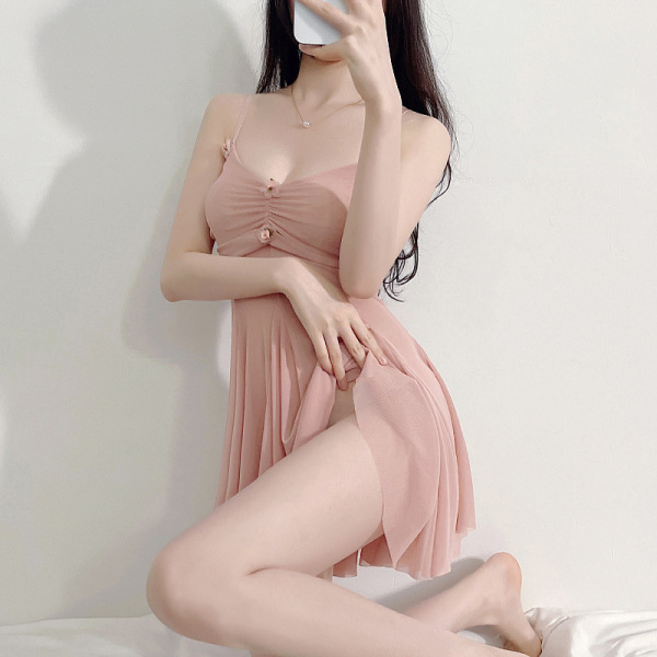 Woman wearing pink lace sleepwear set with sheer mesh cami and shorts, designed for small bust enhancement and sexy lingerie ...