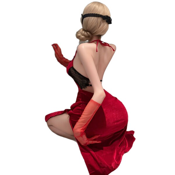 A woman poses in a red qipao-inspired bodysuit with sheer gloves, embodying modest elegance and sensual allure.