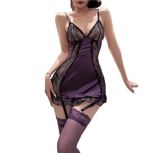 Woman wearing purple plus size lace sheer nightgown with adjustable straps, bodycon fit, and matching thigh-high stockings.