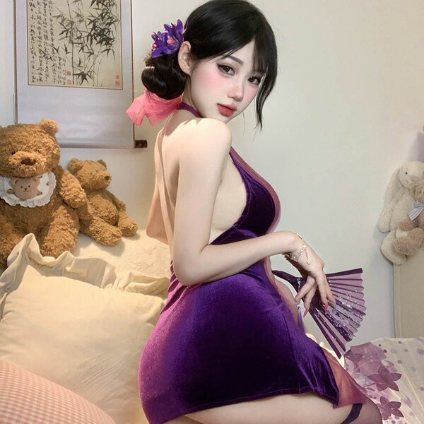 A woman wears a purple velvet cheongsam lingerie set, featuring a sexy sheer backless design with no-remove fabric for effort...