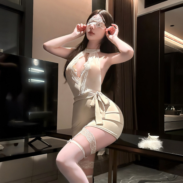 Woman wearing qingshe lace lingerie set, elegant secretary-style bodysuit with lace trim and garter straps, posing indoors.
