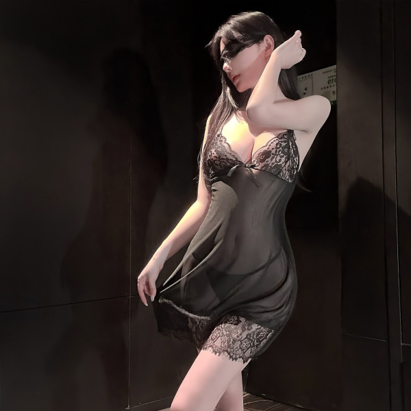 Woman modeling qingshe sheer black lace lingerie set with peekaboo bust and sensual strap design, perfect for outerwear-ready...