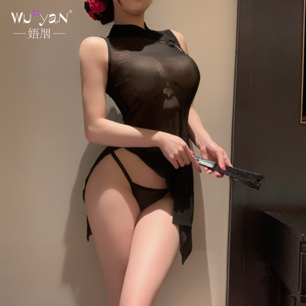Woman wearing black sheer lace cheongsam lingerie with open-crotch design, holding a fan — sensual sleepwear for couples.