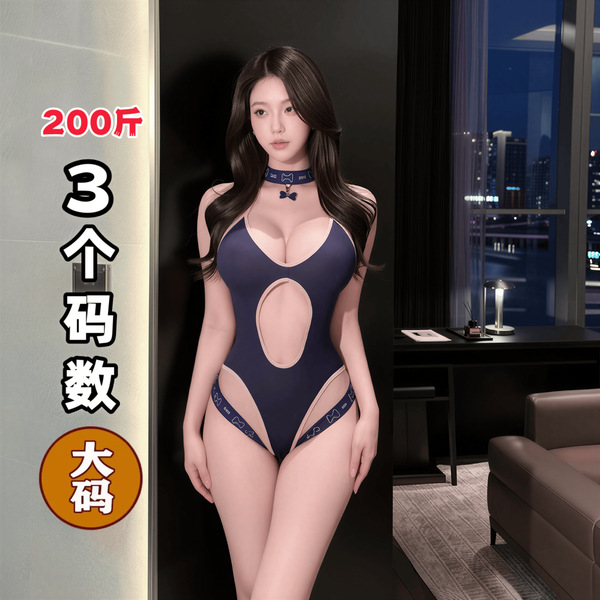 Woman modeling navy blue qqny pure allure lingerie set with cutout detail, choker, and thigh-highs in modern bedroom.