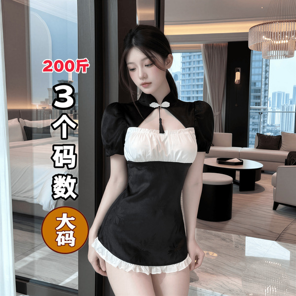 Elegant black and white dress with 3 buttons, designed for womens luxury sleepwear. features a high neckline and ruffled hem.