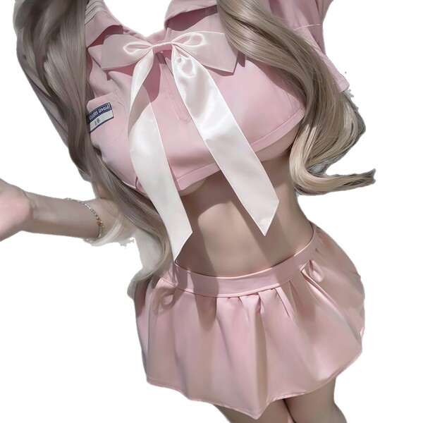 Elegant pink sleepwear set featuring a cute sailor-style top with a large bow and matching pleated skirt, perfect for feminin...
