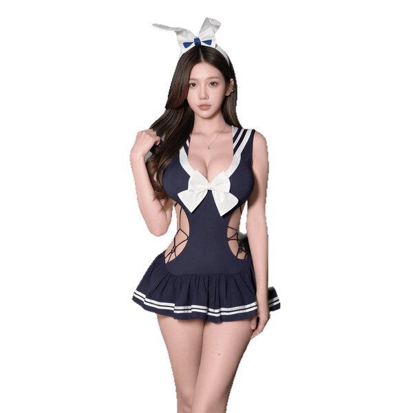A woman wearing a navy blue swimsuit with white accents, featuring a sailor-style design, bow tie, and bunny ears headband.