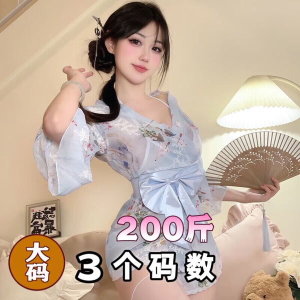 A woman poses elegantly in a light blue sheer sleepwear set, featuring delicate floral patterns and a romantic design. the ou...
