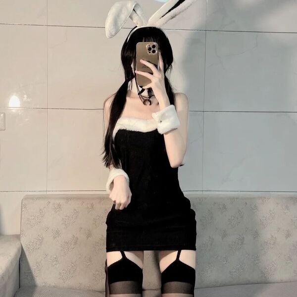 Rabbit girl costume set featuring plush bunny ears, fluffy tail, and black dress with stockings for cosplay and role play.