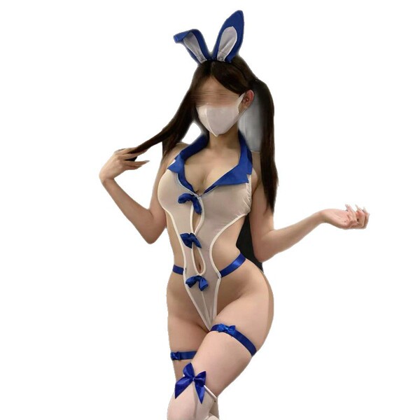 Woman in blue and white rabbit girl lingerie set with bunny ears, bow details, and thigh-highs; playful jk-inspired sleepwear...