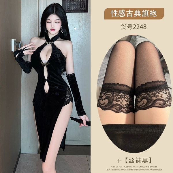 Sexy black velvet dress with lace details, featuring a deep split back design, perfect for vintage-chic allure.
