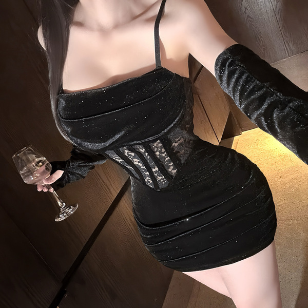A woman wears a black red velvet lace bodycon mini dress, featuring sheer details and thin straps, perfect for a sexy holiday...