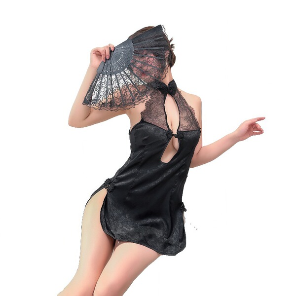 Woman in black retro lace cheongsam lingerie with sheer mesh back, holding fan to face. vintage-inspired sexy costume.