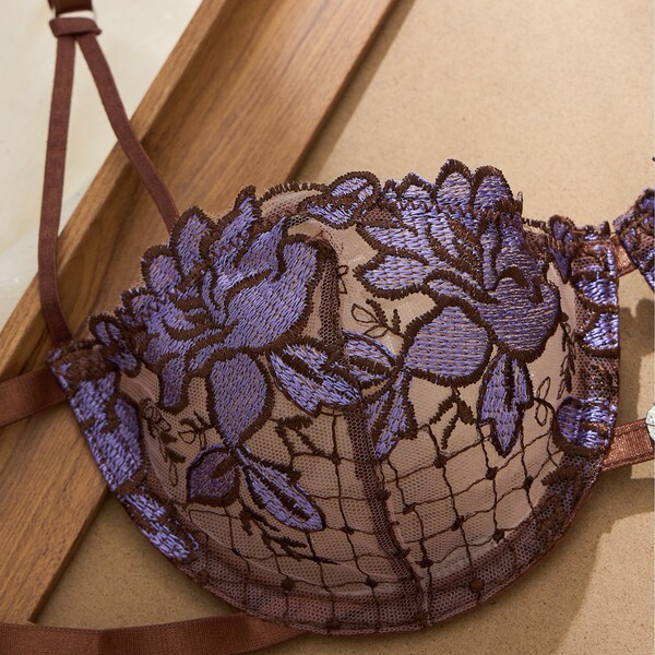 Sheer purple lace bra with floral embroidery, part of russian lace lingerie set.
