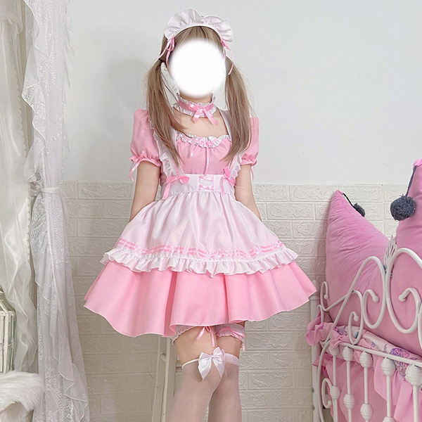 A woman models a charming pink s4xl maid costume cosplay dress, featuring ruffled details and a voluminous skirt, perfect for...