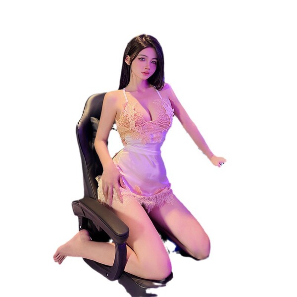 Woman wearing seductive backless lace sleepwear with adjustable halter neck, posing on a chair in soft lighting.