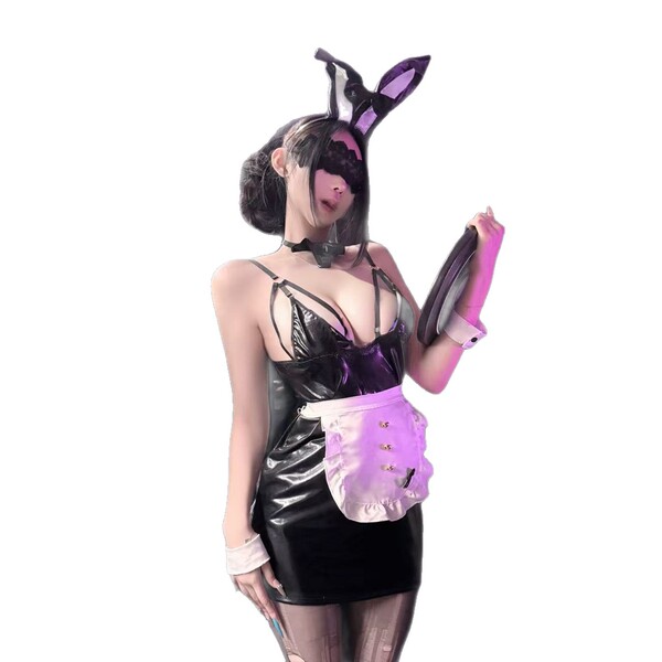 Woman in black bunny girl lingerie set with ears, mask, and apron. provocative sleepwear costume for women.