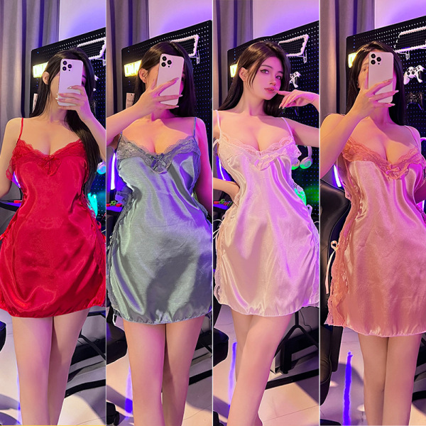 Woman modeling red, green, white, and pink seductive lace lingerie sleepwear sets in a vibrant room.