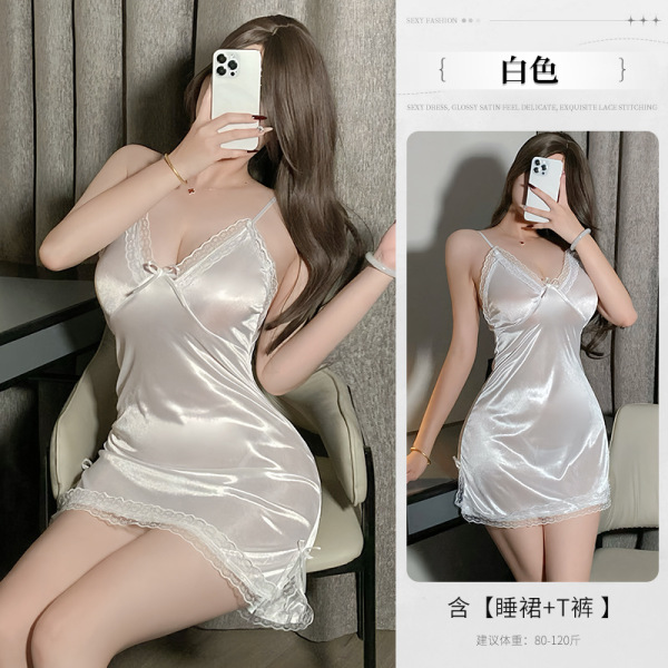 Woman modeling white satin lace sleep dress, sheer thin lingerie with delicate trim for intimate date night wear.
