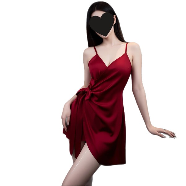 Woman wearing elegant red satin cami dress with side knot detail, perfect for curvy figures.