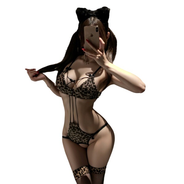 Woman wearing seductive leopard print lingerie set with cat ears, featuring no-remove design and tempting -inspired sleepwea...
