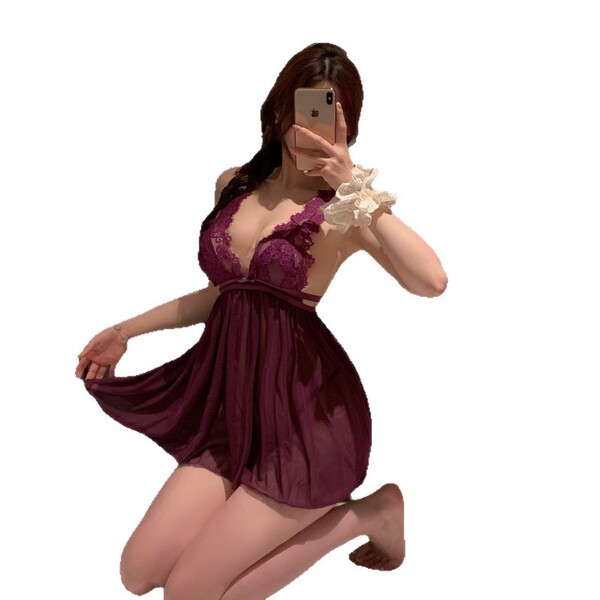 Woman in burgundy lace lingerie set, kneeling selfie pose. seductive -inspired sleepwear for women.