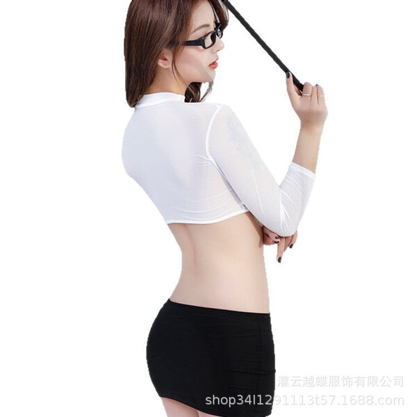 Woman wearing a white cropped top and black mini skirt, holding a riding crop. seductive maid costume lingerie set - modest y...