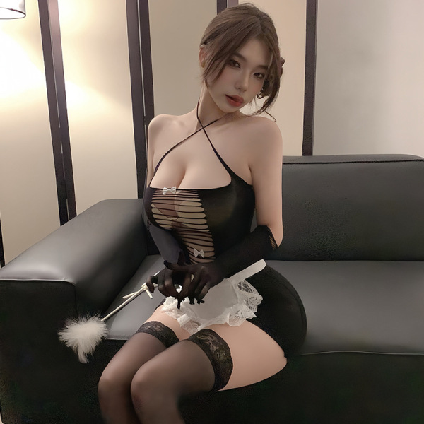 Woman wearing black sheer mesh maid lingerie with tear-away chest and open-crotch design, paired with lace stockings and glov...