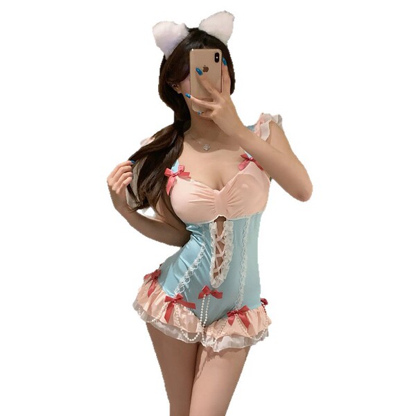Woman wearing a seductive maid costume with blue and pink accents, featuring lace details and bunny ears.