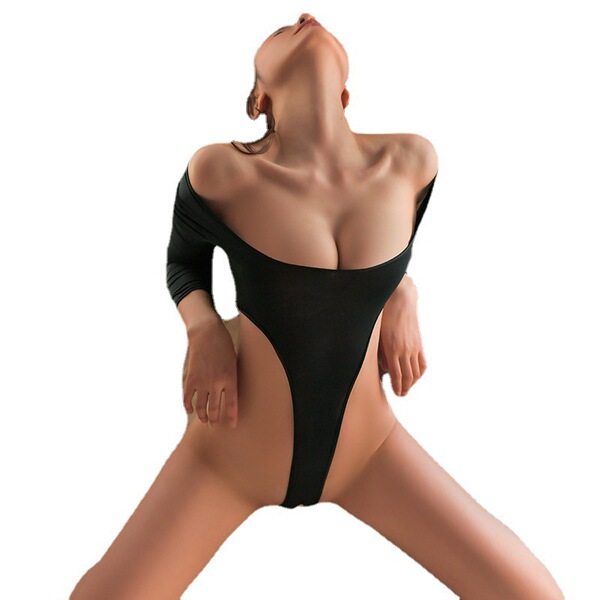 Woman wearing black open-crotch bodysuit with sheer cutouts and off-shoulder design, posing seductively in ice silk lingerie.