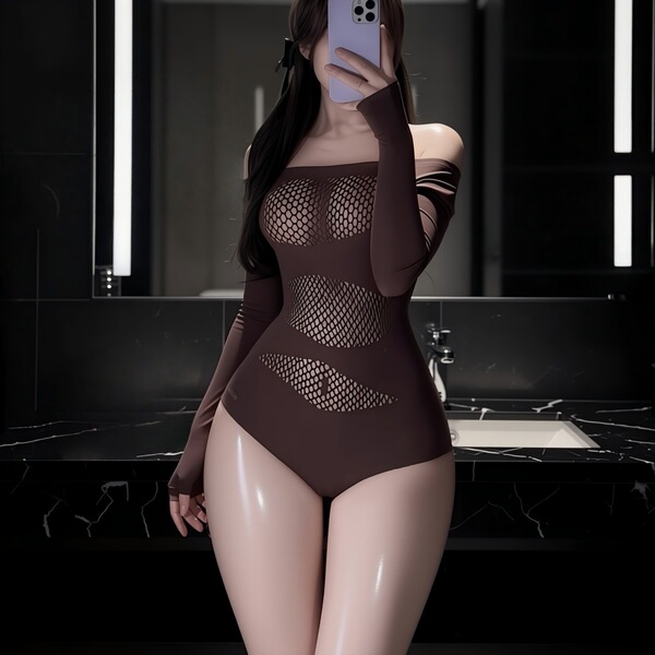 Woman in brown sheer mesh lingerie set taking mirror selfie, featuring lace details and off-shoulder design for plus size cur...