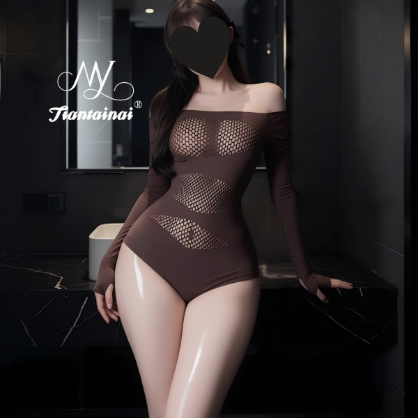 Woman wearing seductive plus size lace mesh lingerie set with sheer panels and off-shoulder design in a modern bathroom setti...