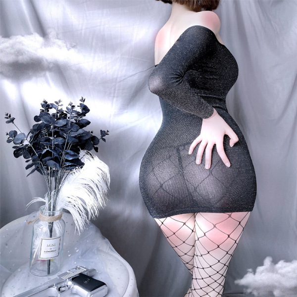Woman wearing black off-shoulder mini dress with fishnet stockings, styled for nightclub or live streaming.