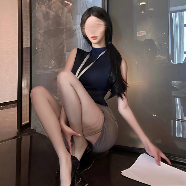 A stylish woman poses with a high-waisted bodycon skirt set, featuring a sleek top and elegant design, perfect for an office ...