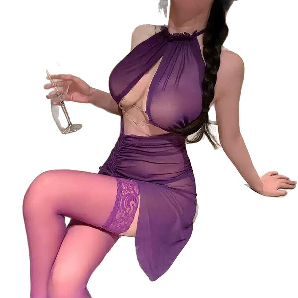 Woman in purple sheer lace lingerie dress with side slit, holding wine glass.